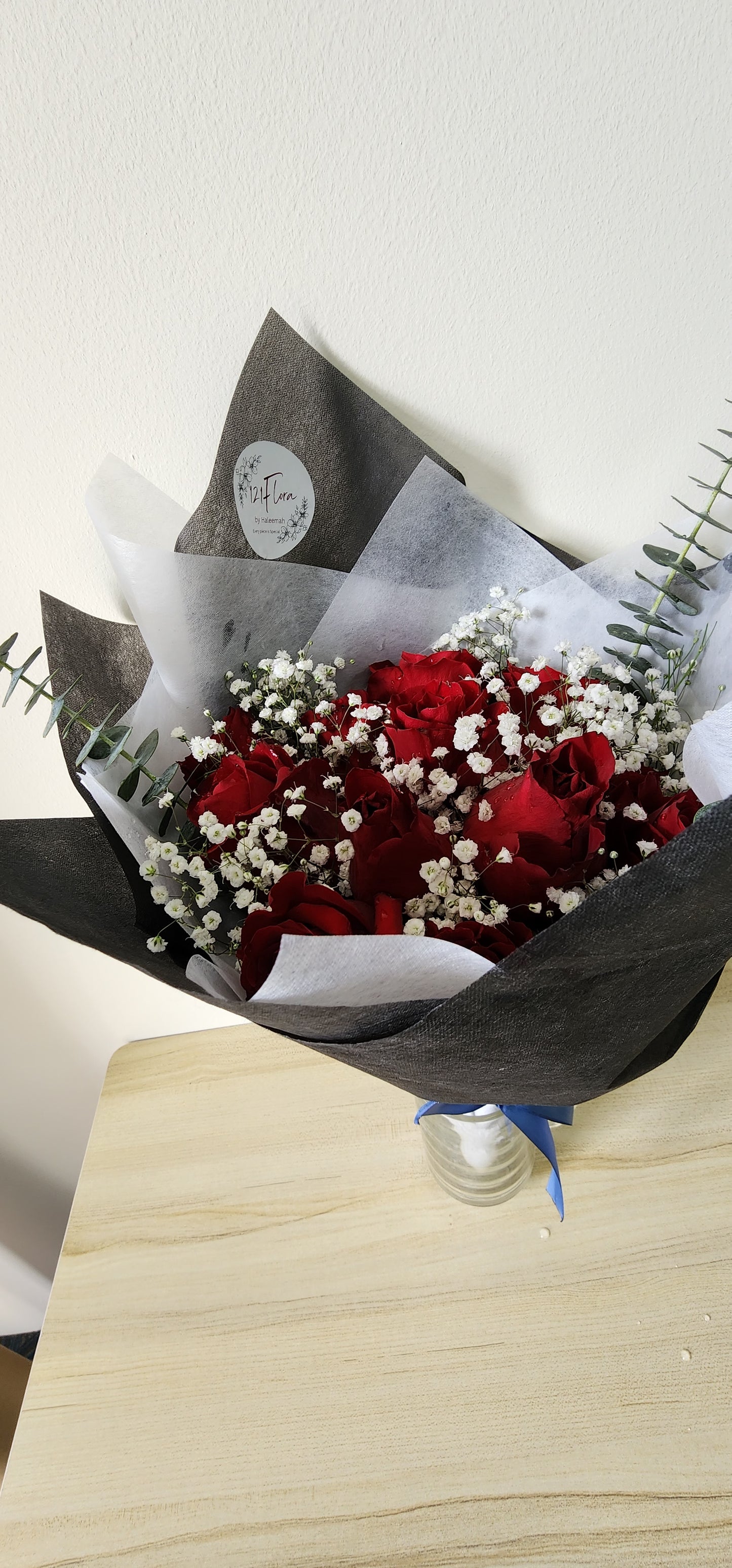 Crimson Crescendo: A Dazzling Dance of 12 Stalks of Red Roses